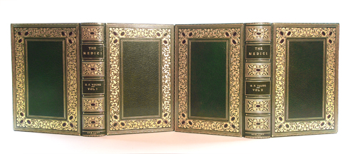 G. F. Young's "The Medici", NY 1920; in two volumes; 8vo, matching in Full Emerald Green Crushed Morocco, Boards Bordered in Extra-gilt and Extra Wide Panel Borders, with three Black Oval morocco Onlays each Corner.  Spine Panels with Titles in Two panels, others Extra Gilt with Black Morocco Ovalk Onlays; Fifty-six Onlays in all