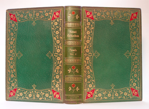     A volume of the "Pamela set, showing the onlaid corner pieces of the boards, and the onlaid roses of the spine. Again, the spine (sunned) has been retouched to approximate the green of the original state.