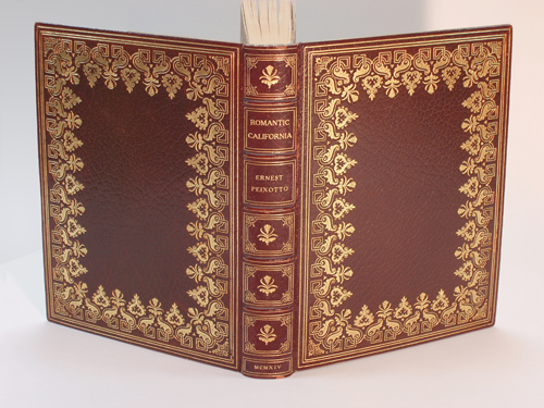 Ernest Piexotto's "Romantic California", 8vo, in Full Deep Brown Crushed Morroco; Boards with very wide Borders composed of symmetrical scroll-and-block elements alternating with floral  devices.  The Spine Panels with same floral tools used also alternating. Double gilt-rules at the board perimeter, and double gilt rules with corner fillets in the spine panels.